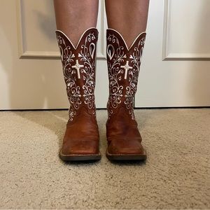 Cowgirl boots with white stitched cross